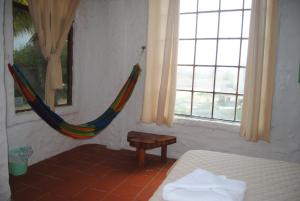 Voodi või voodid majutusasutuse Hostal Galapagos by Bar de Beto toas