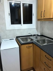 Kuchyňa alebo kuchynka v ubytovaní Beta's place - Apartamento primera línea de playa