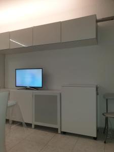 TV i/ili multimedijalni sistem u objektu residence los molinos
