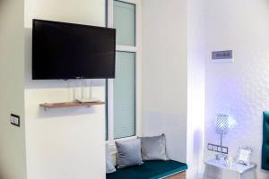 Televízia a/alebo spoločenská miestnosť v ubytovaní Apartment Jacuzzi