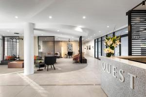 an office lobby with a suntrust sign on the wall at Quest Goulburn in Goulburn