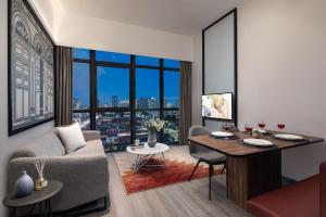 Citadines Rochor Singapore的电视和/或娱乐中心