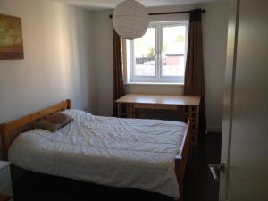 A bed or beds in a room at York Apartments 