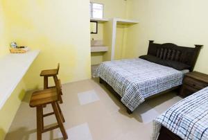 Postel nebo postele na pokoji v ubytování Posada del Rey Azúcar