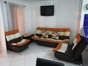 Un lugar para sentarse en Hermoso apartamento cómodo y tranquilo cerca a todo en Guatapé por días