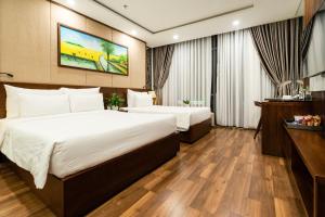 Ένα ή περισσότερα κρεβάτια σε δωμάτιο στο Nagila Boutique Hotel