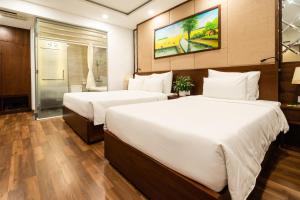 Ένα ή περισσότερα κρεβάτια σε δωμάτιο στο Nagila Boutique Hotel