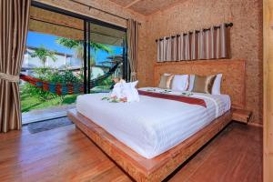 Letto o letti in una camera di Baan Check In