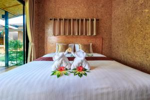 Letto o letti in una camera di Baan Check In