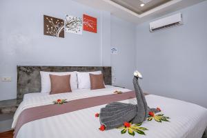 Letto o letti in una camera di Baan Check In