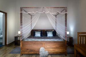 Postel nebo postele na pokoji v ubytování Madla rooms