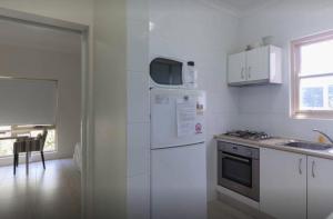 Köök või kööginurk majutusasutuses M102 West Perth Studio Apartment near Kings Park