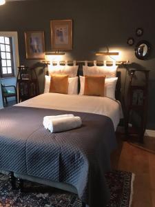 Voodi või voodid majutusasutuse B&B du Cloître toas