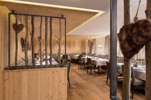 Veitingastaður eða matsölustaður á Hotel Comploj Adults only