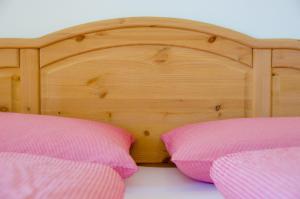A bed or beds in a room at Mairhof