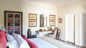 Villa Adalbert Guesthouse tesisinde bir odada yatak veya yataklar