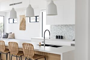 A kitchen or kitchenette at Mandala Beach House Jervis Bay