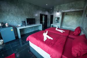 The Loft House Sakaeo的电视和/或娱乐中心