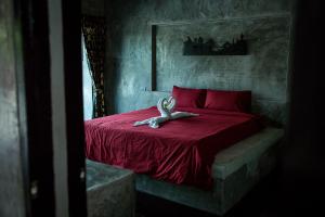 The Loft House Sakaeo客房内的一张或多张床位