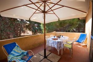 Гостиная зона в Residence Golfo Della Lacona