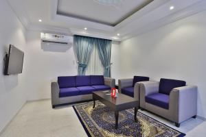 Гостиная зона в Qasr Al Hamra ApartHotel Al Hamra Branch