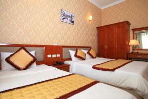 Letto o letti in una camera di ATS Hotel