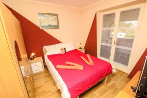 Posteľ alebo postele v izbe v ubytovaní A4 Goga 1 two bedroom apartment near the beach and the sea