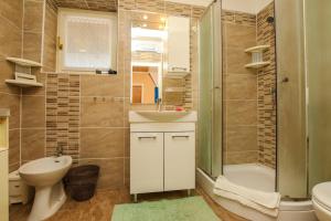 Kúpeľňa v ubytovaní A4 Goga 1 two bedroom apartment near the beach and the sea