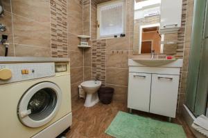 Kúpeľňa v ubytovaní A4 Goga 1 two bedroom apartment near the beach and the sea