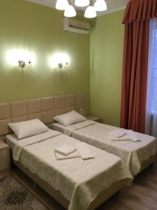Un ou plusieurs lits dans un hébergement de l'établissement Donskaya Riviera Hotel