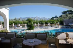 a view of the pool from a hotel patio at Grand Hotel Aminta in Sorrento