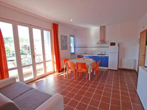 A kitchen or kitchenette at Residence Il Pavone