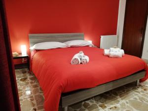 Postel nebo postele na pokoji v ubytování Le Gorgoni b&b