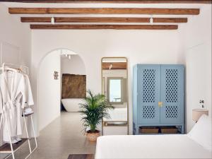 Postel nebo postele na pokoji v ubytování Belvedere Mykonos - Hilltop Rooms & Suites - The Leading Hotels of the World