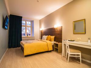 Postel nebo postele na pokoji v ubytování Allure Rooms & Coffee