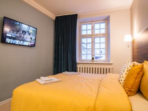 Postel nebo postele na pokoji v ubytování Allure Rooms & Coffee