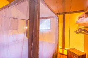 Posteľ alebo postele v izbe v ubytovaní Dune Agriturismo