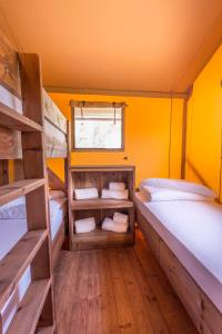 Posteľ alebo postele v izbe v ubytovaní Dune Agriturismo