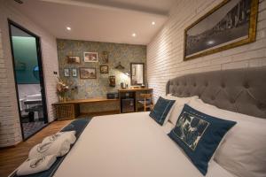 Postel nebo postele na pokoji v ubytování Carnarvon Suites By Reunion
