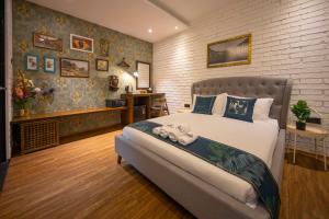 Postel nebo postele na pokoji v ubytování Carnarvon Suites By Reunion