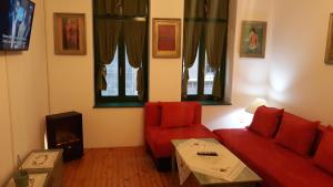 TV o dispositivi per l'intrattenimento presso Guesthouse Hurma Rooms