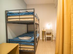 Postel nebo postele na pokoji v ubytování Allure Rooms & Coffee