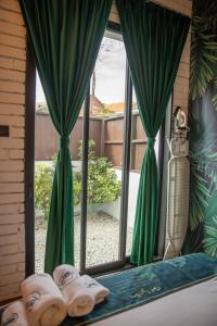 Postel nebo postele na pokoji v ubytování Carnarvon Suites By Reunion