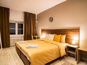 Postel nebo postele na pokoji v ubytování Allure Rooms & Coffee