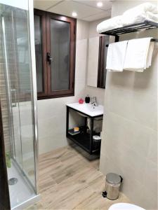 Koupelna v ubytování Entre patios y flores