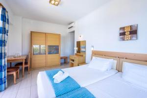Postel nebo postele na pokoji v ubytování Raffaello Beach