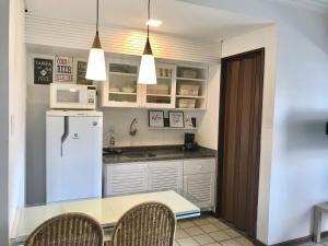 
A kitchen or kitchenette at Atlantic Towers - Flat Ondina
