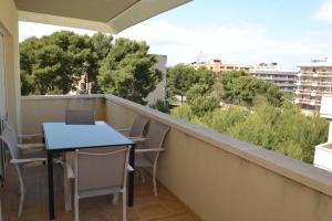 a balcony with a table and chairs and a view at WVP - Aqua I in Salou