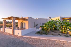 a house in the middle of a desert at Milis Houses in Adamantas