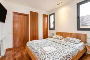 Lova arba lovos apgyvendinimo įstaigoje Stay U-nique Apartments Plaça de Tetuan